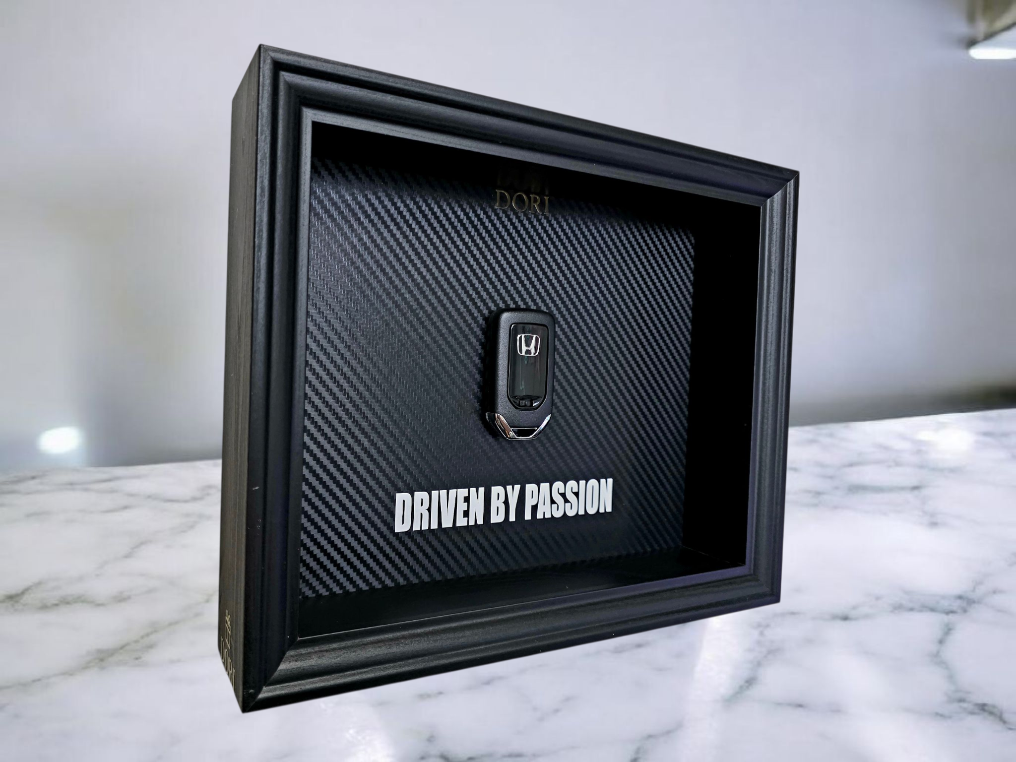 Honda rakto paveikslas – DRIVEN BY PASSION – DORI