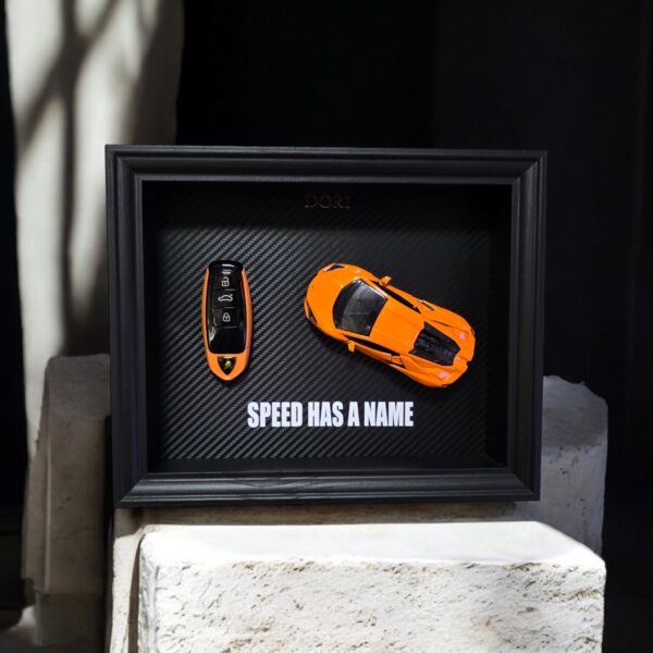DORI motyvacinis paveikslas su Lamborghini rakteliu ir fraze Speed Has a Name