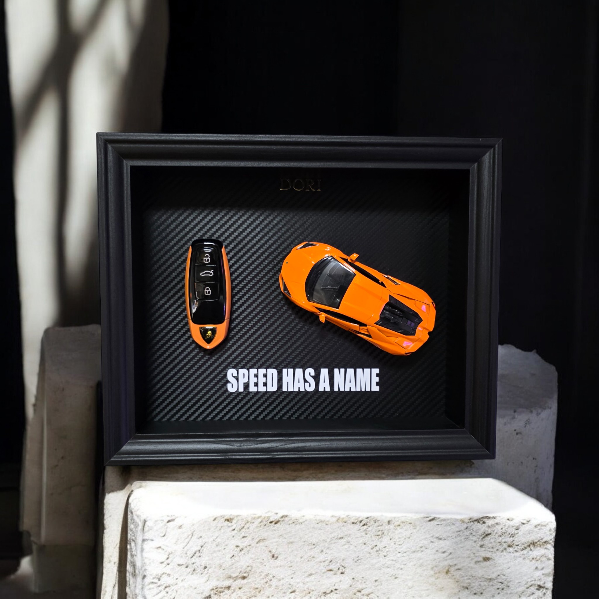 DORI motyvacinis paveikslas su Lamborghini rakteliu ir fraze Speed Has a Name